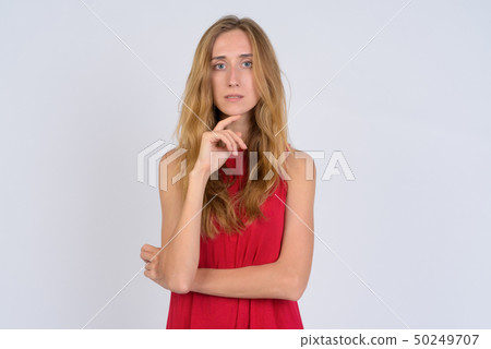 Portrait of young beautiful blonde woman thinking 50249707
