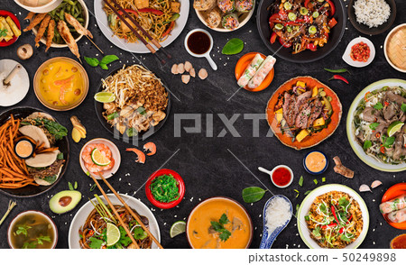 Asian food background with various ingredients on rustic stone background , top view. Asian food background with various ingredients on rustic stone background , top view. 50249898