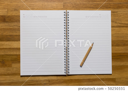 Pencil on notebook on wooden table, to do list Pencil on notebook on wooden table, to do list 50250331