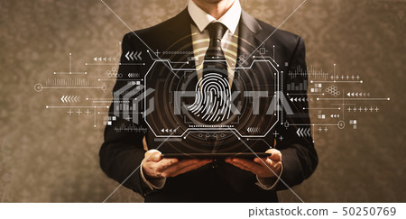 Fingerprint scanning theme with businessman 50250769