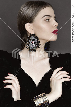 Portrait of young beauty dark hair girl in vintage 50251170