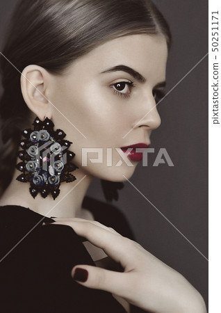 Portrait of young beauty dark hair girl in vintage 50251171
