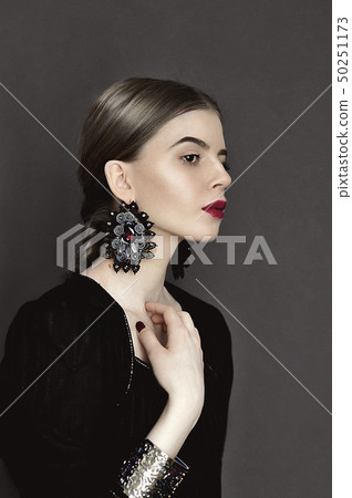 Portrait of young beauty dark hair girl in vintage 50251173