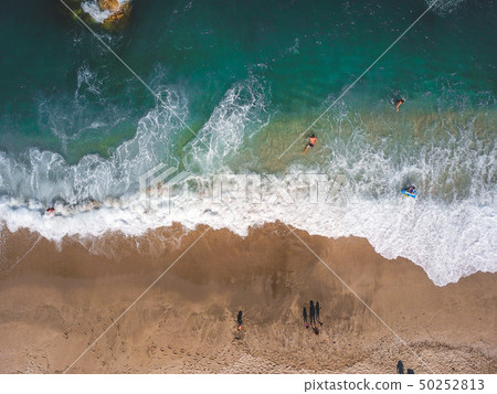 Aerial View From Flying Drone Of People Relaxing Aerial View From Flying Drone Of People Relaxing 50252813
