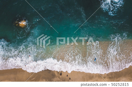 Aerial View From Flying Drone Of People Relaxing Aerial View From Flying Drone Of People Relaxing 50252815