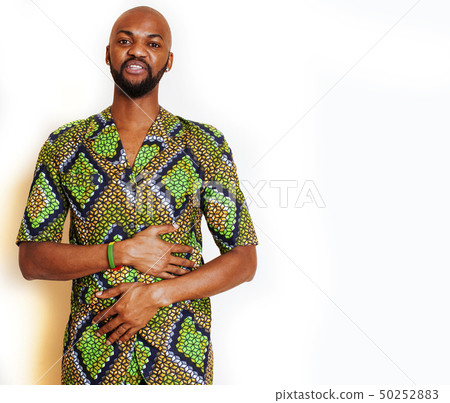 portrait of young handsome african man wearing bright green national costume smiling gesturing portrait of young handsome african man wearing bright green national costume smiling gesturing 50252883