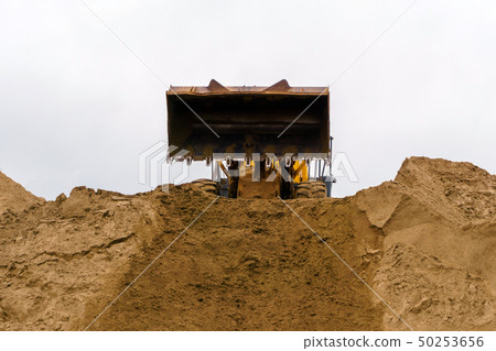 construction earthworks, moving sand 50253656