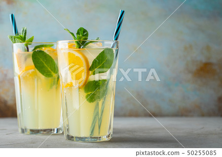 Two glass with lemonade or mojito cocktail. Two glass with lemonade or mojito cocktail. 50255085