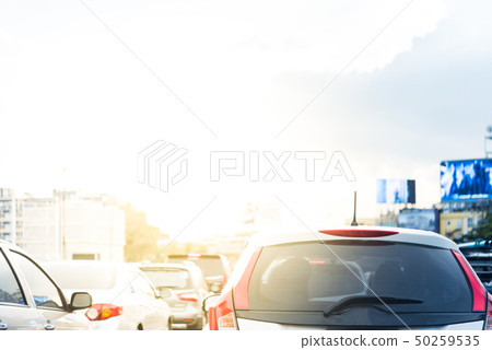 Cars on busy road in the city with traffic jam Cars on busy road in the city with traffic jam 50259535