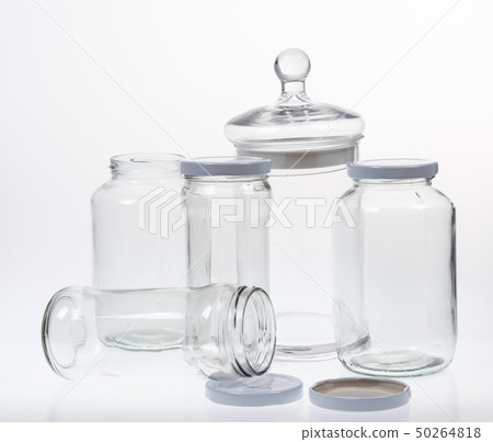 Collection of empty jars on white background Collection of empty jars on white background 50264818