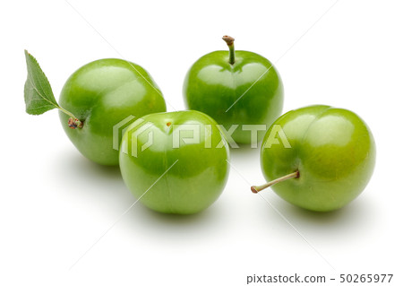 Fresh green plums with leaf isolated on white 50265977
