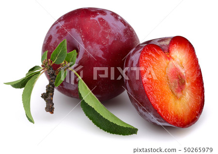 Red plums with leaves isolated on white 50265979