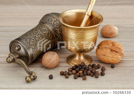 Kitchen spice hand mill and bronze muller grinder Kitchen spice hand mill and bronze muller grinder 50266330