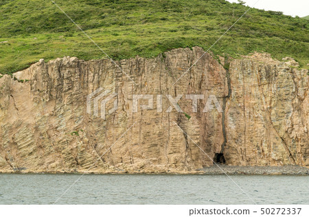Cliffs of the island Chihusato Island Cliffs of the island Chihusato Island 50272337