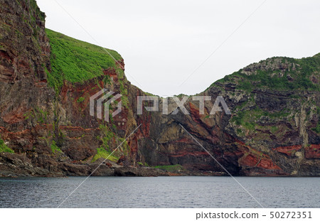 Cliffs of the island Chihusato Island 50272351