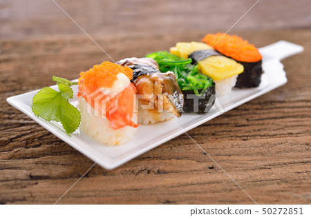 Sushi Set nigiri and sashimi served in long white 50272851