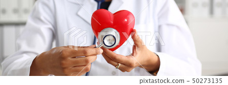 Beautiful black smiling female doctor hold Beautiful black smiling female doctor hold 50273135