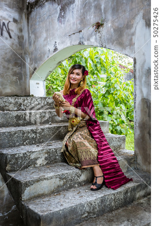 Beautiful Woman with Thai Traditional Dress King Beautiful Woman with Thai Traditional Dress King 50275426
