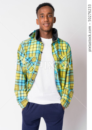 Portrait of young happy African hipster man smiling 50276233