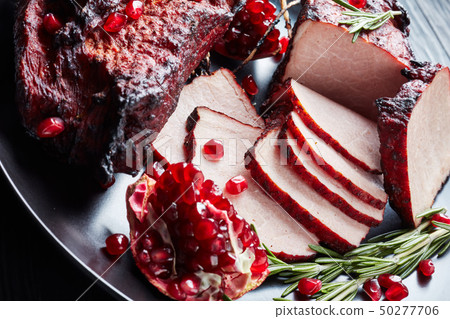 close-up of two pieces of smoked meat 50277706