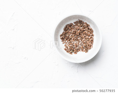 Flax seeds with copy space Flax seeds with copy space 50277935