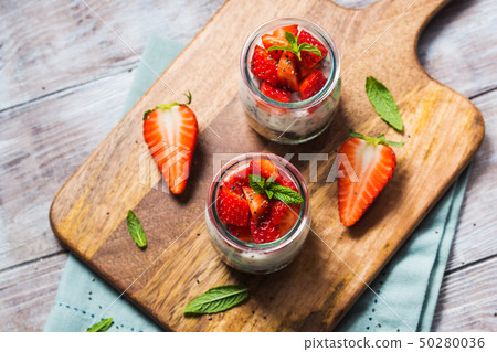 Yogurt and granola with strawberries. Breakfast Yogurt and granola with strawberries. Breakfast 50280036