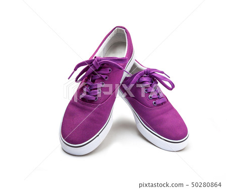 A pair of pink color canvas shoes isolated on A pair of pink color canvas shoes isolated on 50280864