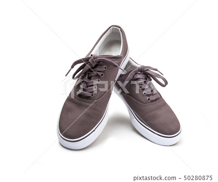 A pair of brown canvas shoes isolated on white A pair of brown canvas shoes isolated on white 50280875