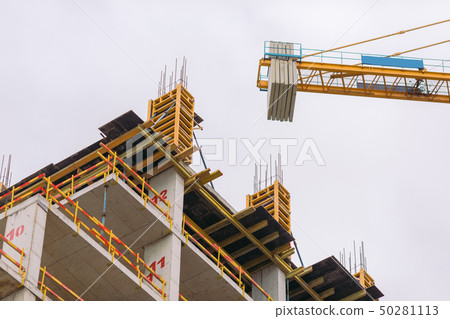 construction yellow crane and building construction site construction yellow crane and building construction site 50281113