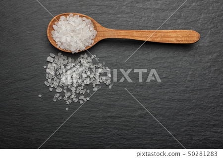 white crystals sea salt on wooden spoon white crystals sea salt on wooden spoon 50281283