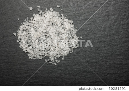 white salt on black background 50281291
