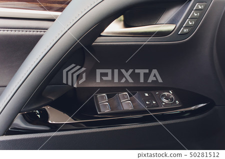 Car inside. Interior of prestige modern car. Climate control, hi-end sound speakers, seat memory 50281512