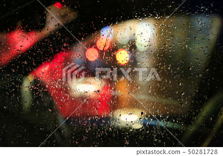 Lights of night city through the glass of the car 50281728