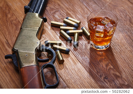 Wild west rifle and ammunitions with glass of Wild west rifle and ammunitions with glass of 50282062