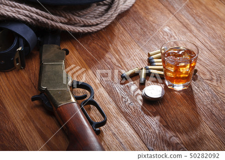 Wild west rifle and ammunitions with glass of Wild west rifle and ammunitions with glass of 50282092