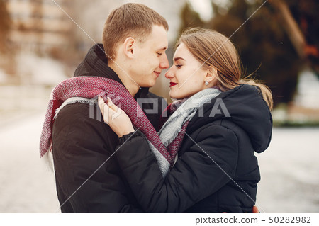 couple in a park couple in a park 50282982