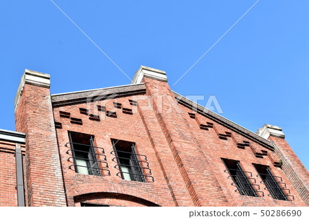 Red brick warehouse and blue sky Red brick warehouse and blue sky 50286690