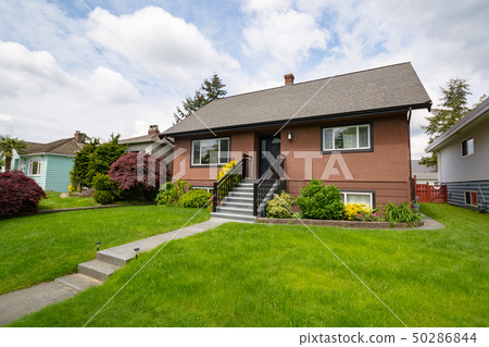 Average brown residential house built on land Average brown residential house built on land 50286844