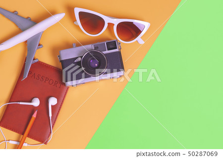 travel objects and accessories on orange green 50287069