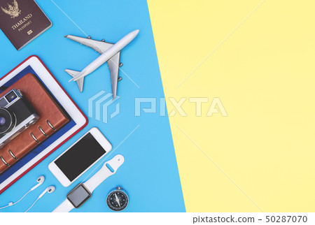 travel objects and accessories on blue yellow 50287070