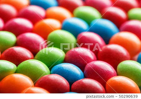 Rainbow colors of multicolored candies close-up, 50290639