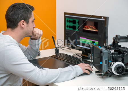 young man designer using graphics tablet for video young man designer using graphics tablet for video 50293115