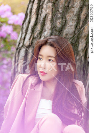 Woman relaxing in the park 50293799