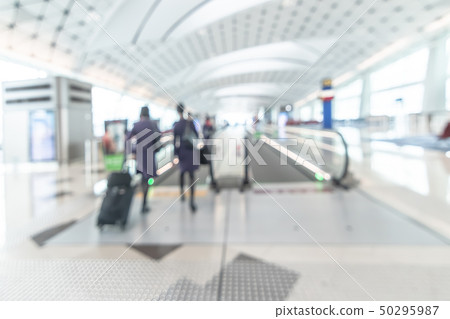 Airport blurred background interior with travelers 50295987