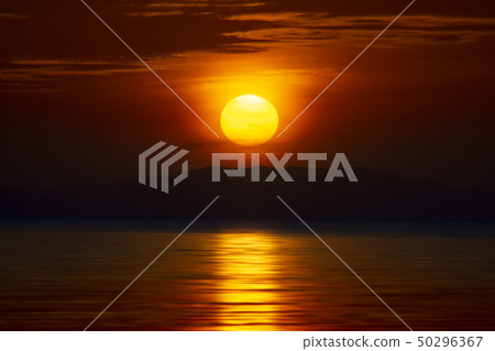 Sunset at the lake on the golden hour. 50296367