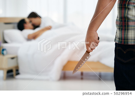 Husband holding knife before killing 50296954