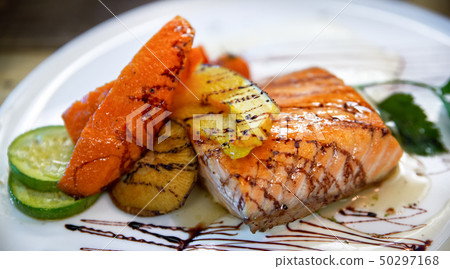 Salmon steak on dish in Grill seafood restaurant  50297168
