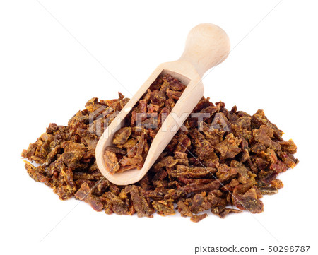 Propolis granules in a wooden shovel are isolated Propolis granules in a wooden shovel are isolated 50298787
