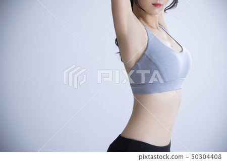 Young woman exercise 50304408