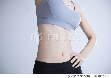 Young woman exercise 50304412